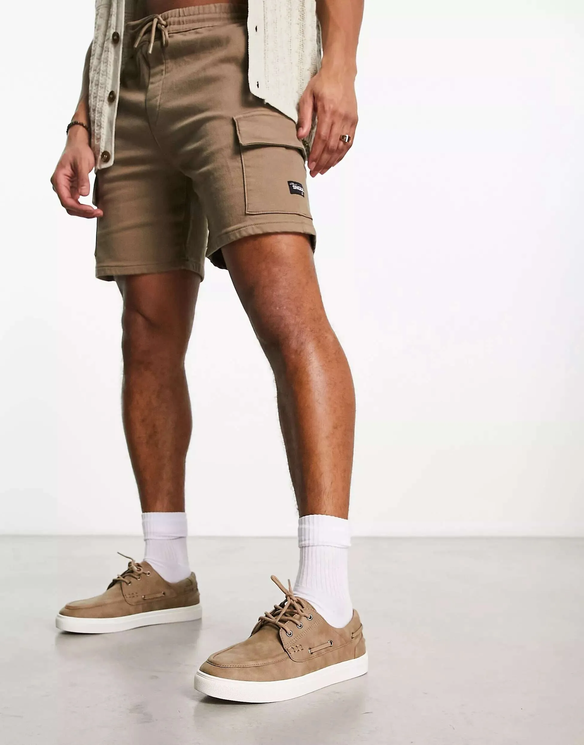 ASOS faux leather boat shoes with stones and white sole